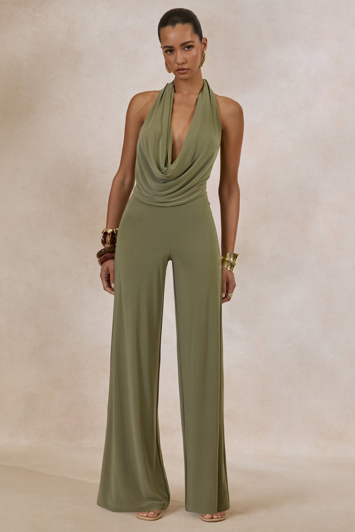 ECM_HR_CL137527037---Clemence-_-Green-Plunge-Neck-Jumpsuit-0.jpg
