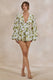 ECM_HR_CL138228110---Caron-_-White-And-Green-Floral-Broderie-Plunge-Neck-Playsuit0.jpg